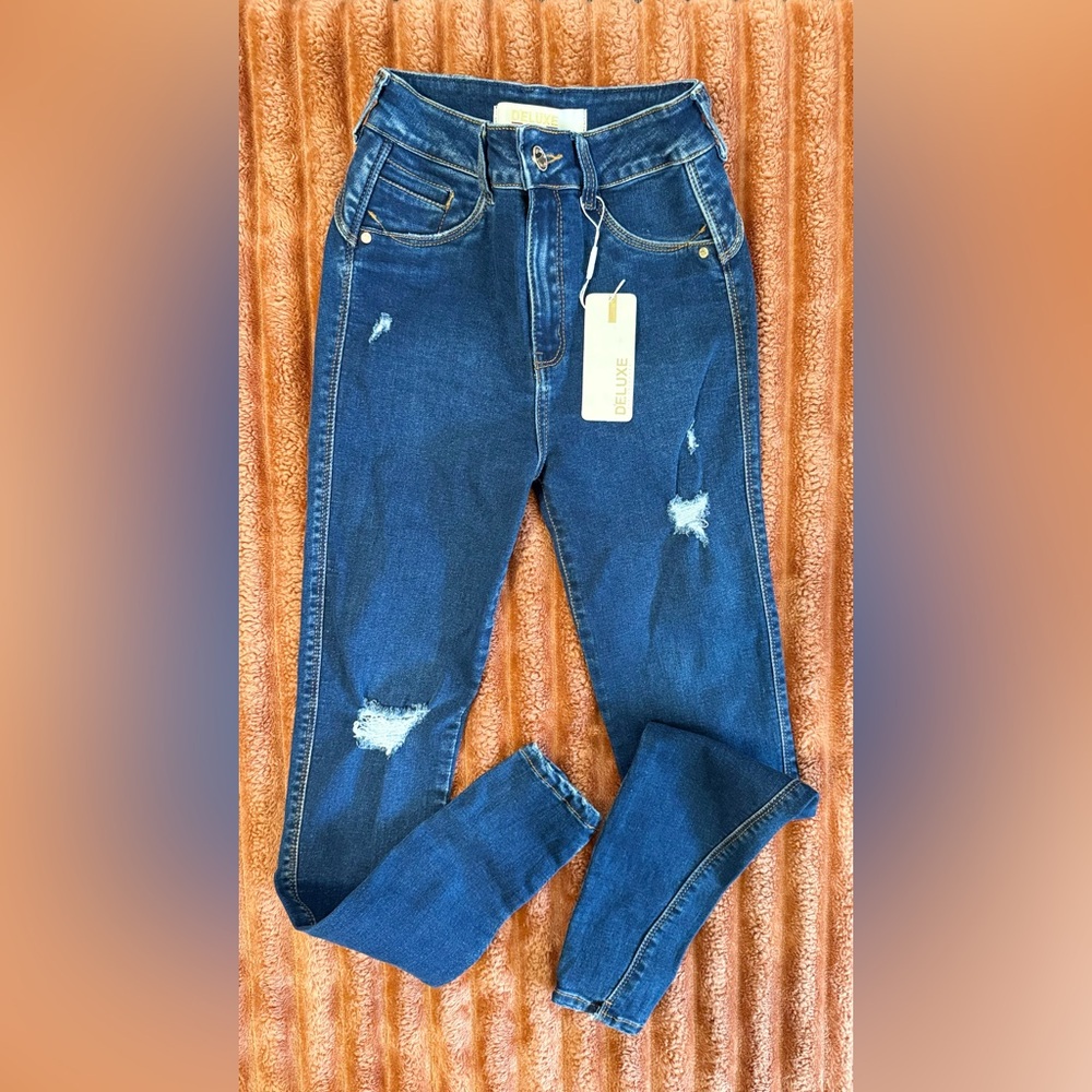Luxe Blue Straight Leg Jeans with Fashionable Distressing